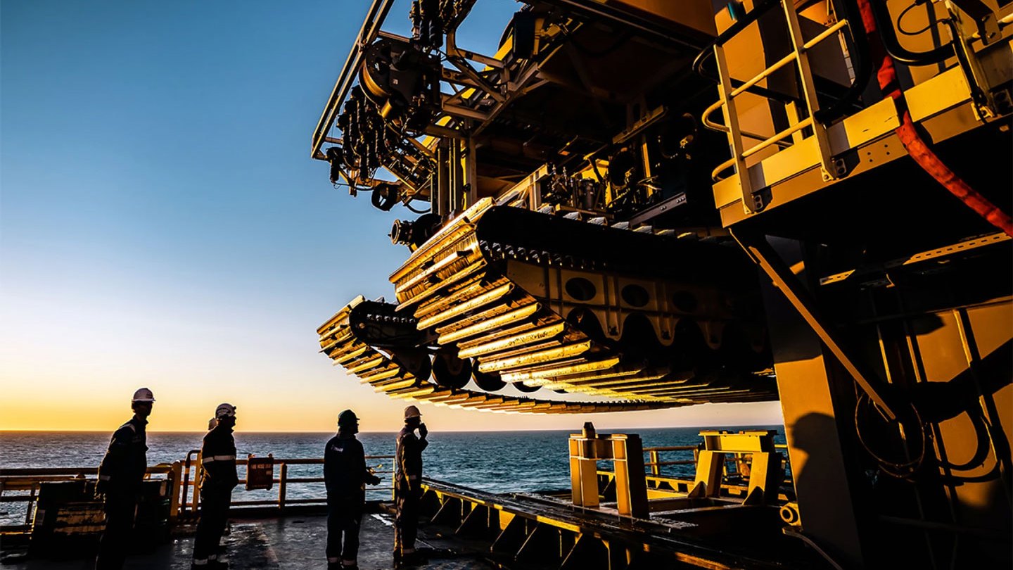 A photograph of a company launching equipment to test mining of polymetallic nodules from the seafloor.